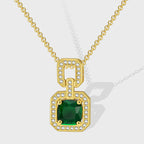 Gold plated necklace with a green octagonal stone pendant and clear-stone link