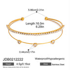 Double-row cuff with hanging clear accents