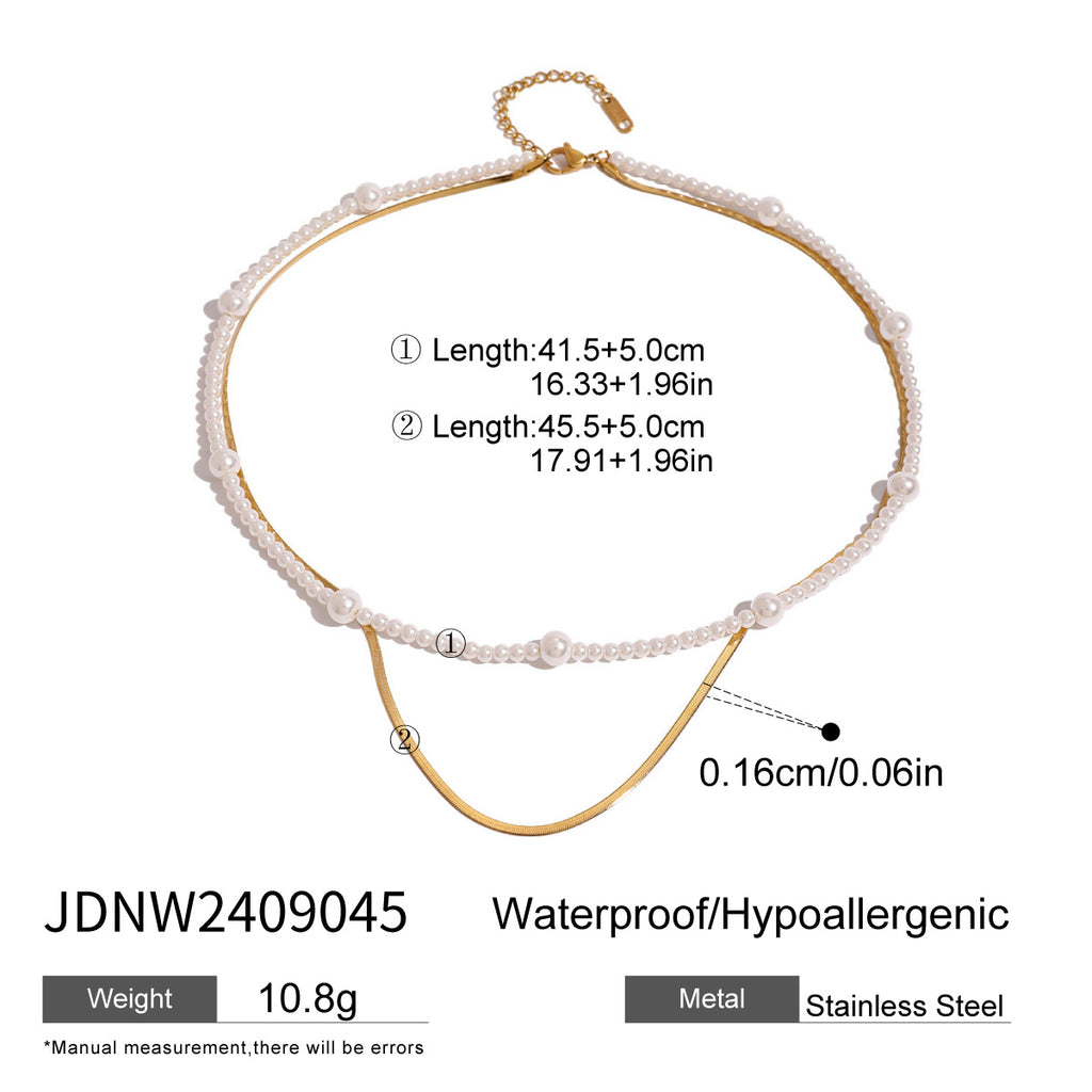 Layered necklace with separate strand lengths and chain width