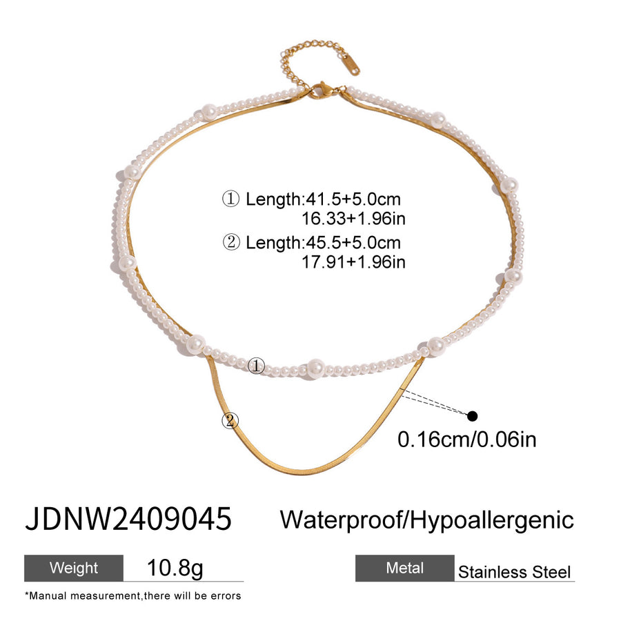 Layered necklace with separate strand lengths and chain width