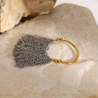 Top view of the slim ring band and draped chains