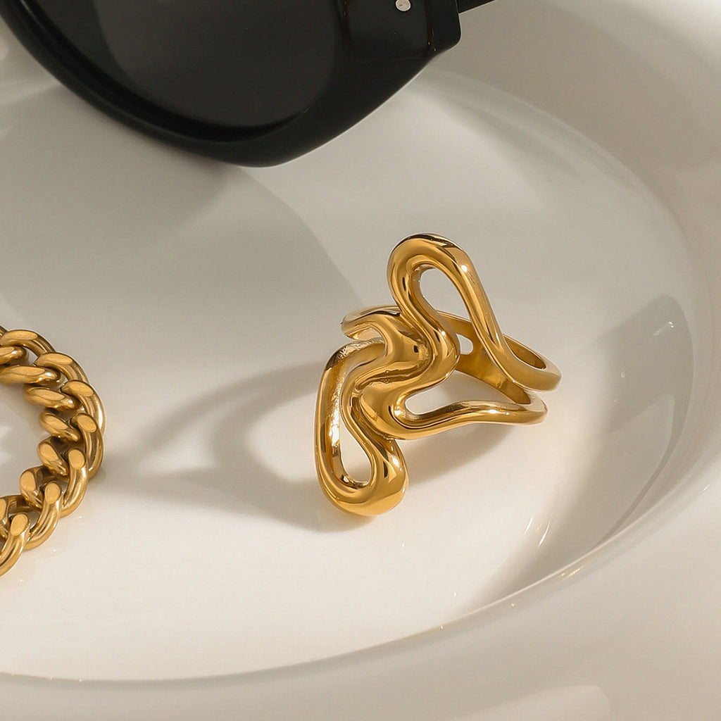 Two-Tone Sculptural Stainless Steel Open Ring Collection – flat-lay view