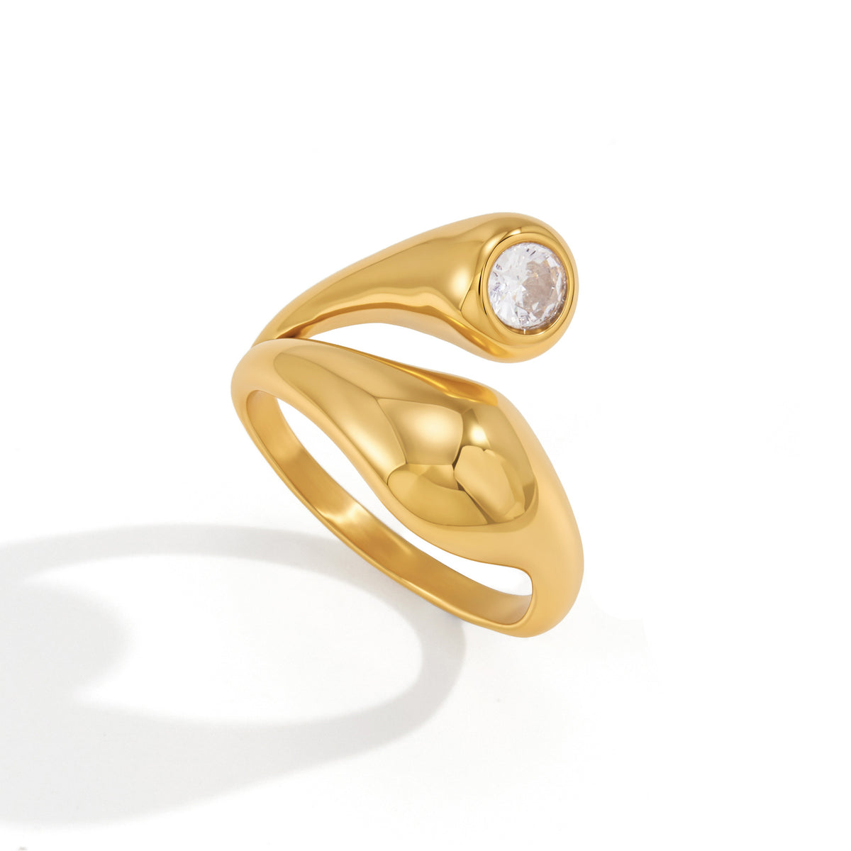 Polished teardrop end and round clear stone close-up