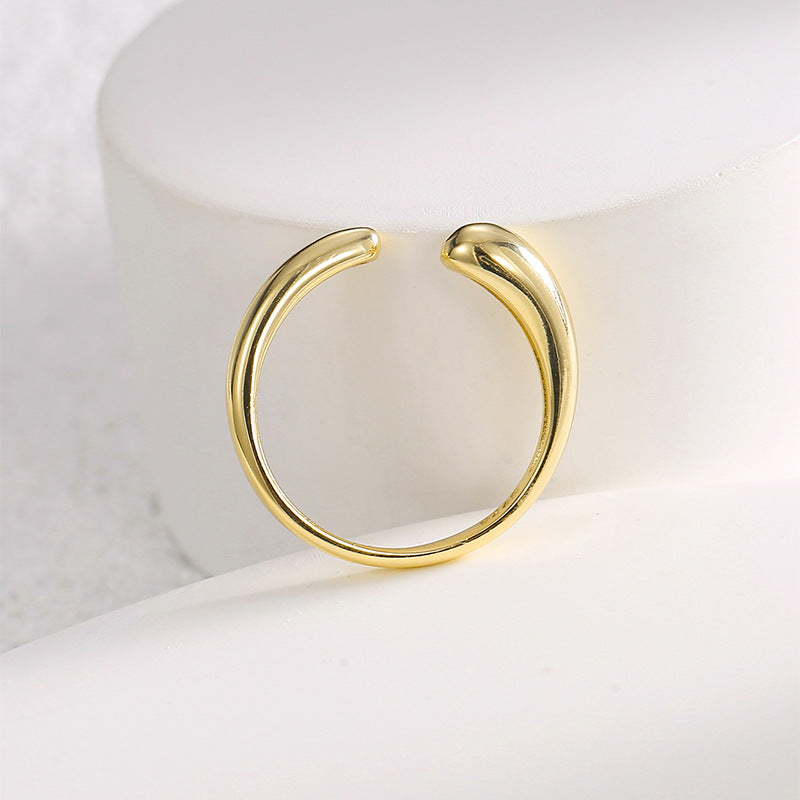front view of smooth stone-free teardrop open ring