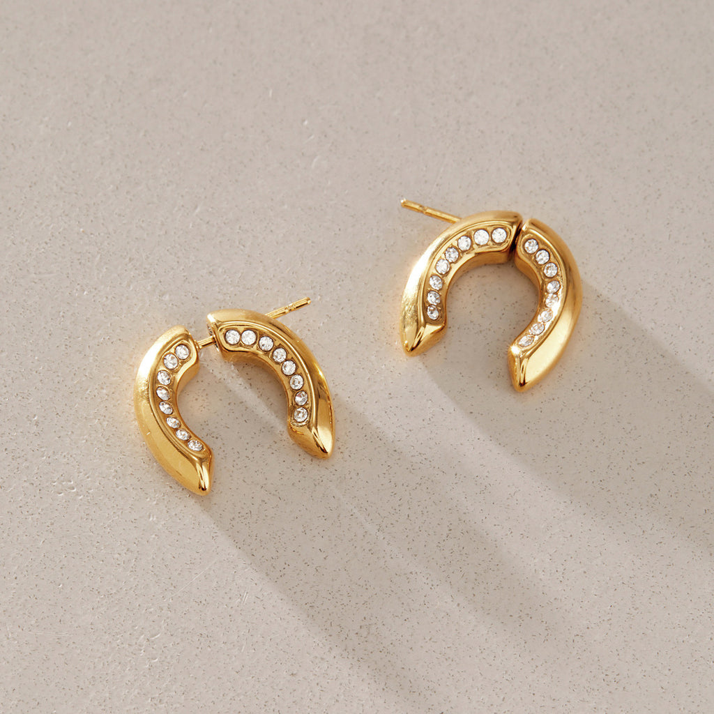 Gold-tone U earrings with inner clear accent rows