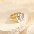 gold plated stainless steel flower ring with ivory petal inlays