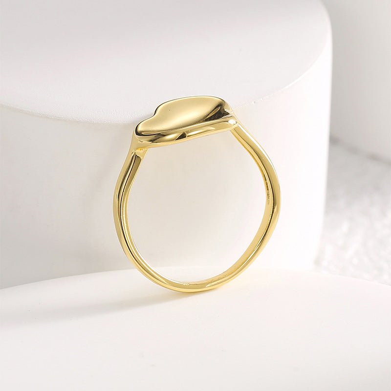rear view of sculpted leaf setting on gold plated ring