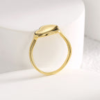rear view of sculpted leaf setting on gold plated ring