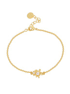 centered product view of the fine clear stone turtle station bracelet