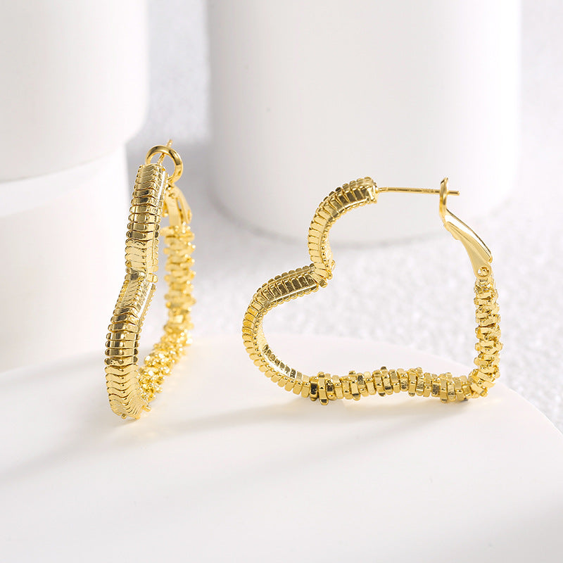 gold plated textured heart hoops shown open and closed