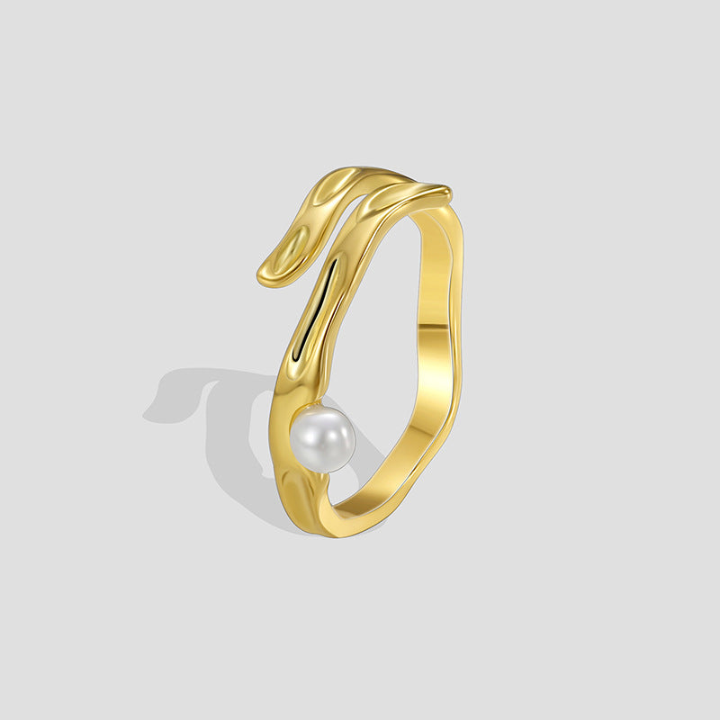 gold plated brass sculptural ring with a single shell pearl