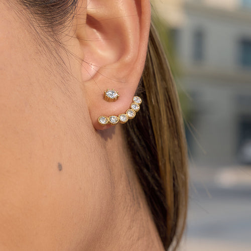 side view of curved five-stone ear jacket earring