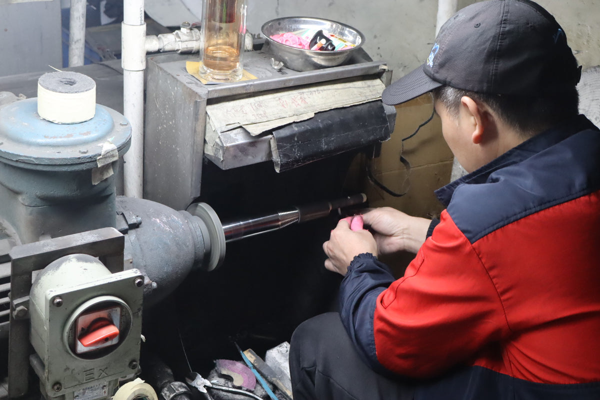 Jewelry components being polished in the workshop